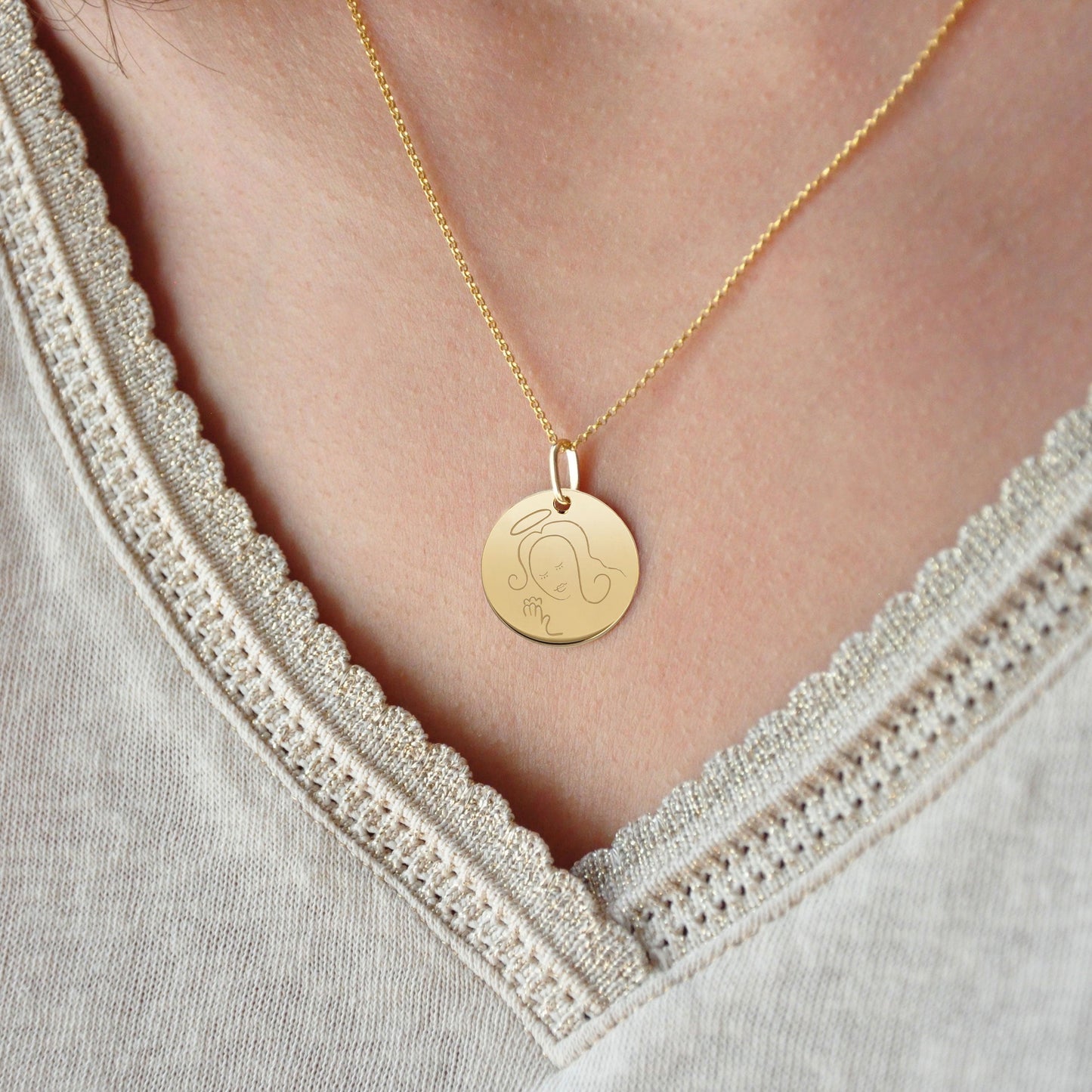 Muze 18k gold vermeil Faith medal necklace on model, art inspired jewelry, dainty talisman symbol of hope, protection and spirituality. A sentimental gift perfect for newly born, godchild or as a friendship thank you gift.