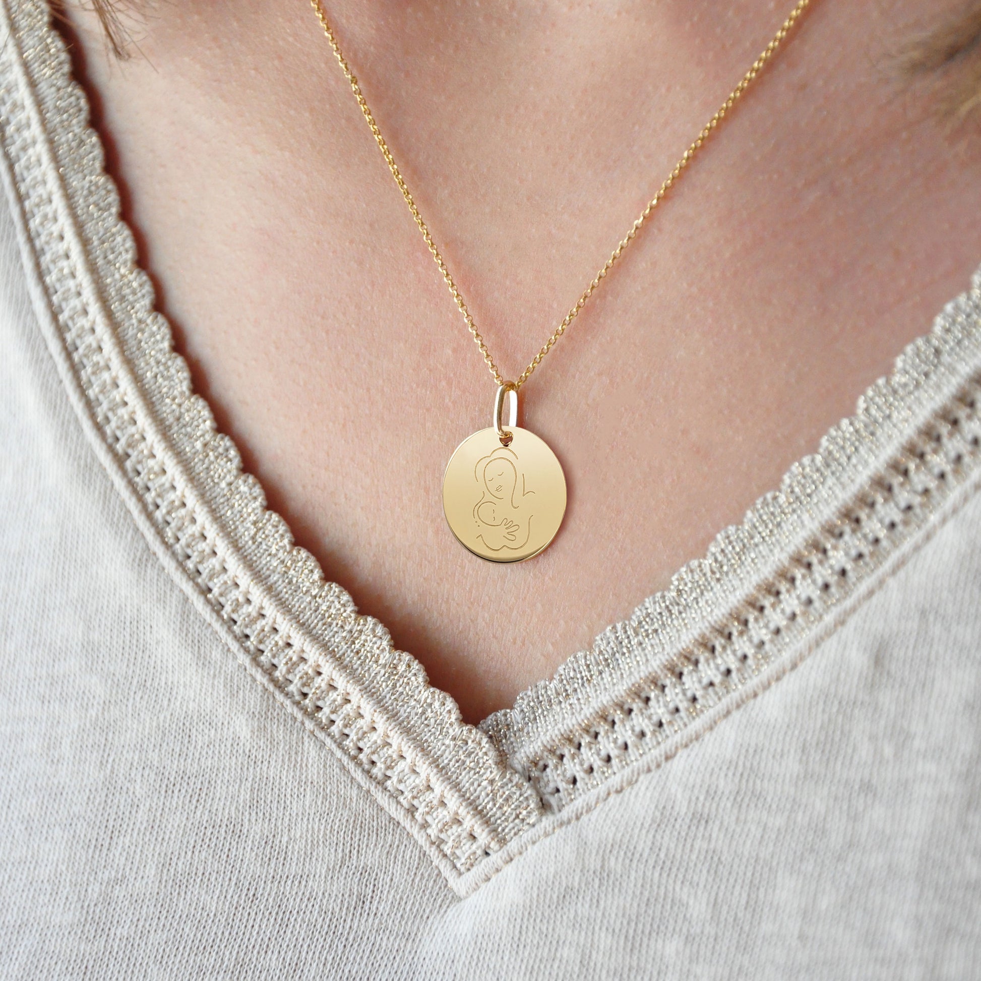 Muze 18k gold Vermeil Child Medal necklace, art inspired jewelry symbol of love, protection, tenderness and motherhood. A meaningful sentimental gift perfect for mother, newly born or godchild