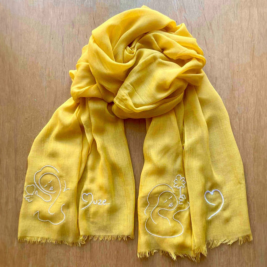 Muze yellow lightweight scarf in modal and silk with embroidery of peace, love, heart and Muze logo drawings