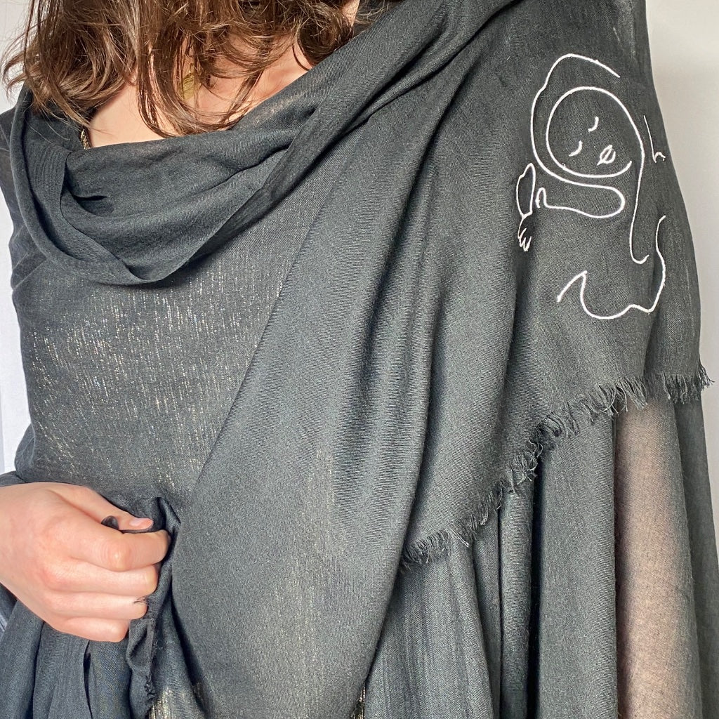 Muze black lightweight scarf modal and silk on model displaying with love embroidery